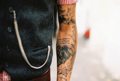 comic tattoos arm.jpg