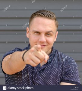 charismatic-young-man-pointing-at-the-camera-with-a-smile-and-raised-eyebrow-posing-in-front-of-a-grey-wall-with-copy-space-in-square-format-T9TTE3.thumb.jpg.b0c81302b542e587b50515979445af8c.jpg