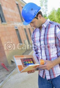 architect-checking-colour-options-on-stock-photo_csp58408341.jpg